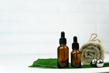 Wellness and spa concept. Body care. Natural oil. Unbranded bottle.Serum and cream