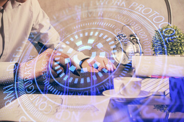 Multi exposure of man's hands holding and using a digital device and data theme drawing. Innovation concept.