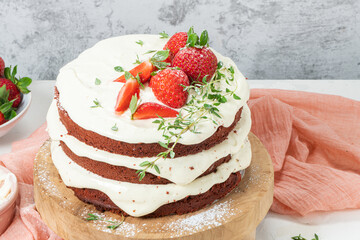 Red velvet cake on wood board. Strawbwrry cake. Devils cake. Wedding dessert. Birthday party. Delicious dessert. Traditional american dessert.