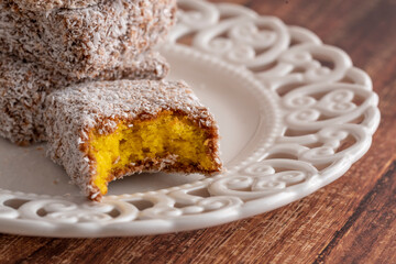 Stack of cakes with coconuts and trace of teeth. Australian cake.
