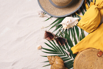 Female beach accessories: swimsuit, bikini, rattan bag, straw hat, shells, sunglasses, palm leaves...