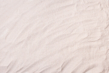 Fototapeta na wymiar Sand texture background. Summer beach top view