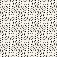 Vector seamless pattern. Repeating texture with wavy dotted lines. Monochrome geometric background. Dotted lines form wavy stripes.