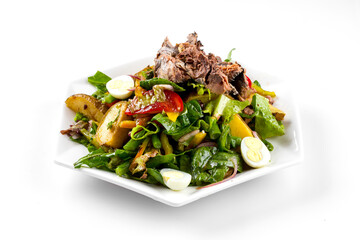 Isolated anchovies nisoise salad on the white background