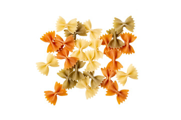 Color pasta in the form of bows. Raw farfalle with spinach and tomato isolated on a white background