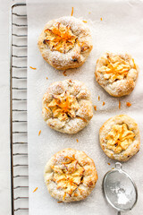 Cheesecake with cottage cheese sprinkled with orange shavings.