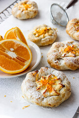 Cheesecake with cottage cheese sprinkled with orange shavings.