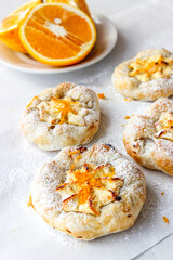 Cheesecake with cottage cheese sprinkled with orange shavings.