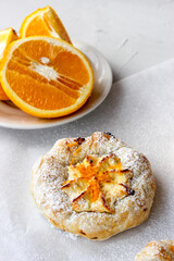 Cheesecake with cottage cheese sprinkled with orange shavings.