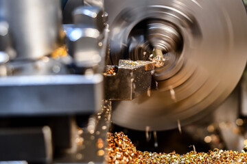 Turning a bronze hairpin with a mechanical cutter on a lathe.