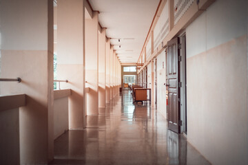 High School hallway corridor in College or university empty hall at classroom, no people student while closed quarantine in situation of Covid-19 disease outbreak result in inability organize learning