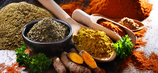 Composition with spices on wooden kitchen table