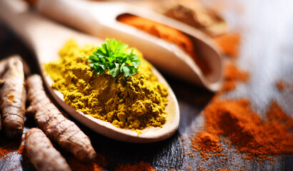Composition with spices on wooden kitchen table