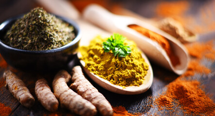 Composition with spices on wooden kitchen table