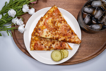 Thinly sliced pepperoni is a popular pizza