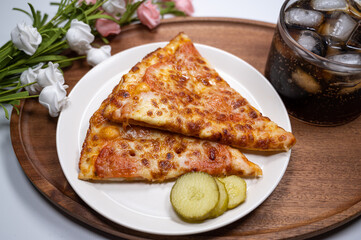 Thinly sliced pepperoni is a popular pizza