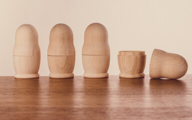 Four nesting Russian dolls on the table.