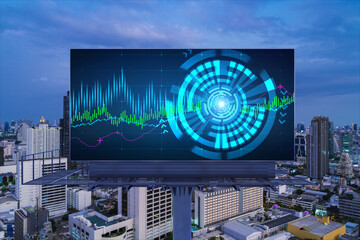 FOREX graph hologram on billboard, aerial night panoramic cityscape of Bangkok. The developed location for stock market researchers in Southeast Asia. The concept of fundamental analysis