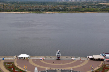 Fototapeta na wymiar View of the Volga from the high bank. Embankment, river and forest.