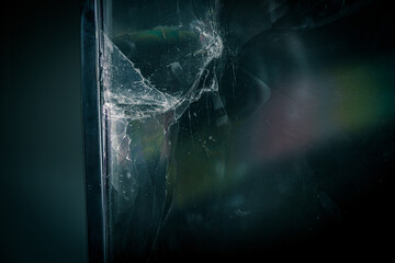 Broken led screen hit by a hammer. The concept of hatred of television.