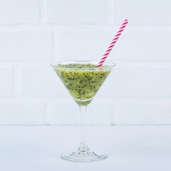 Kiwi fruit smoothie served in martini glass non-alcohol cocktail