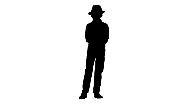 Silhouette Boy in a shirt and straw hat posing with crossed arms and then putting arms on his hips.