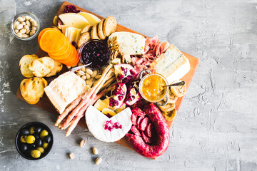 Assortment of tasty appetizers or antipasti. Charcuterie board.