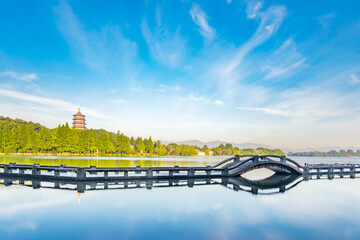 Sunny scenery of Leifeng Tower and Long Bridge in West Lake, Hangzhou, Zhejiang, China