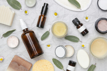 Natural, organic, plastic free skin care products, top view. Facial serums, essentials oils, creams and soap bars. 
