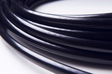 Drip irrigation system close-up. Fragment of a drip irrigation hose in a roll.
