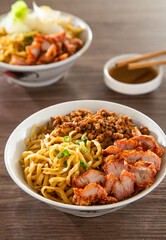 Kolo Mee is a Sarawak Malaysian dish of dry noodles tossed in a savoury pork and shallot mixture, topped off with fragrant fried onions.