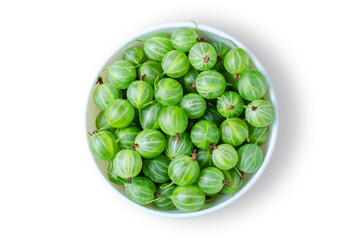 Green gooseberry. Ripe berries in a white plate. Isolated on white
