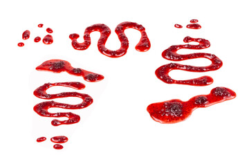 Red jam splashes isolated on white