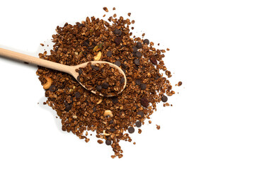 Chocolate granola cereal with nuts in a wooden spoon.