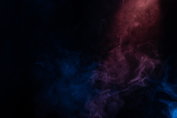 Blue and pink steam on a black background.