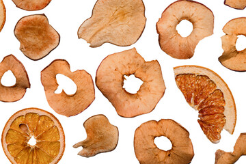 Dried fruit isolated on white background. Dried grapefruit, dried apple, dried pear.