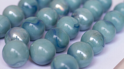Bluish marble balls isolated on a white background