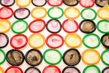 Colorful condoms background.