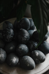 blue-painted easter eggs on the table