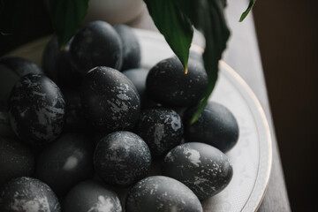 blue-painted easter eggs on the table