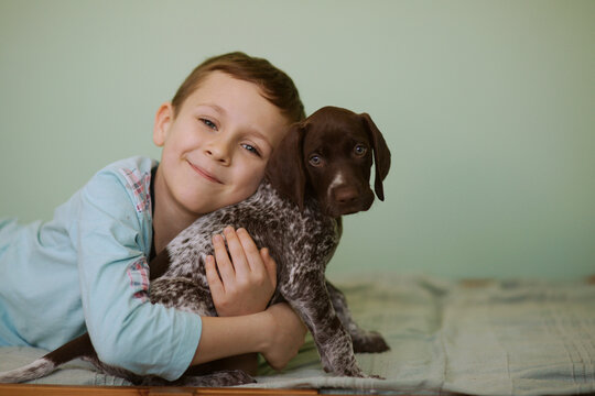 child and dog