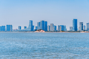 Fototapeta premium CBD building in the central city of Xiamen by the sea in Xiamen, Fujian, China