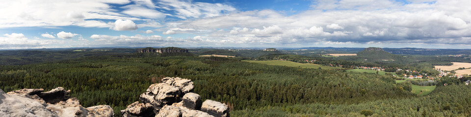 Fototapeta premium Panorama of the Elbe Sandstone mountain range with table mountains