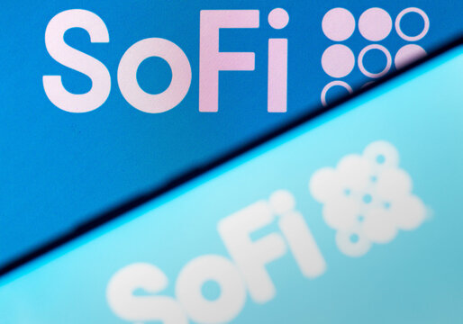 March 28, 2021, Brazil. In this photo illustration the Social Finance (SoFi) logo is seen on a smartphone and a pc screen.