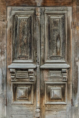 ornate old wooden door with beautiful carvings isolated on white background
