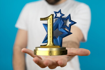 award gold winner first place in hand