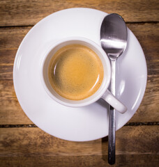 A Cup of Espresso or coffee on a wooden table - studio photography