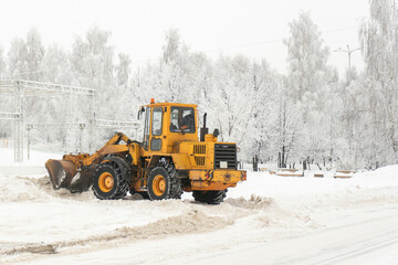 Municipal Service Grader Cleans Snow After Blizzard