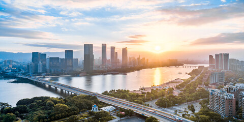 Early morning scenery of CBD city along the Minjiang River in Fuzhou, Fujian, China  © Govan