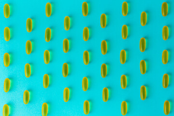 Pills on a light background. Top view. Medicine, treatment, illness. Medication in tablets. Flat lay. Copy space. Medicine concepts. Blue background. 